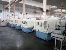 Pump shaft end grinding machine