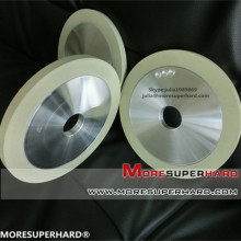 Ceramic diamond bruting wheel for natural diamond