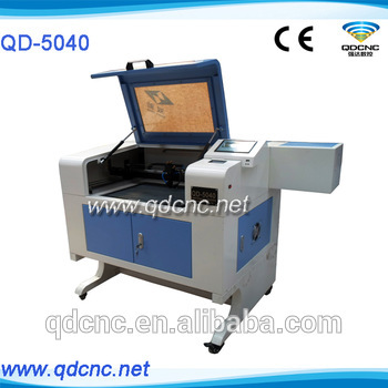 shells laser engraving machines/coconut shell laser engraving machine/sea shell laser engraving machine QD-5040 skype:qdcnc09