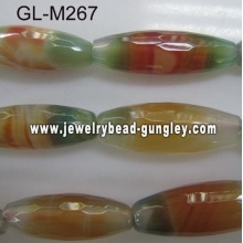 Long rice shape faceted agate bead- red green
