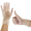 Disposable vinyl exam gloves powder free