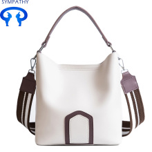 Impact color handbag with a wide shoulder strap