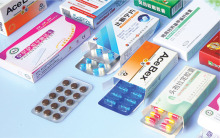 Automatic medicine plate packaging machine