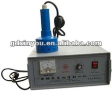 Manual aluminum foil sealing machine