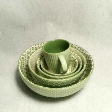 Stoneware items in embossed glaze