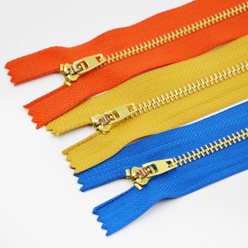 Golden metal zippers