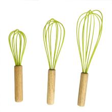 Silicone egg beater with wooden handle