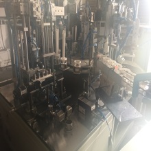 Plastic hardware product assembly machine