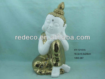 Ceramic gold buddha figurine