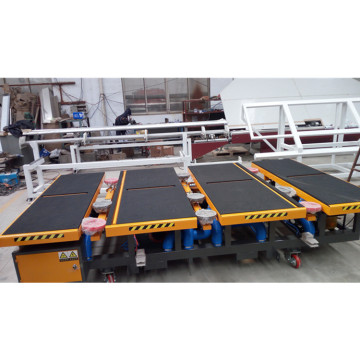 Automatic glass loading table with three arms