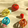 Flera texturer Strawberry Shape Silicone Teething Ball