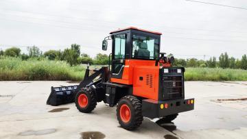 Wheel loader with quick attachment change system