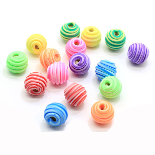 Bunte 10mm weiche Tonpolymerperlen 100Pcs Spiralmuster runder loser Raumperlenball für Schmuckarmbandherstellung DIY