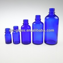 blue glass bottle for essential oil use