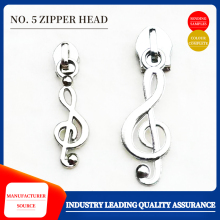 Music symbol zipper head