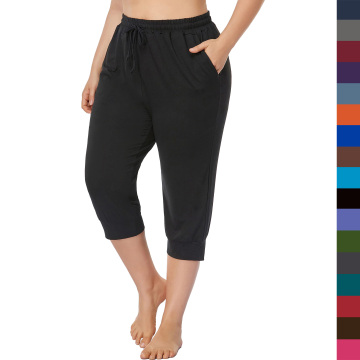 Plus Size Women's Yoga Joggers: Comfortable Cropped Pants with Elastic Waistband, Drawstring, Pockets, and Casual Style