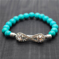 Bracelet de pierres précieuses étirées turquoise avec perles rondes de 8MM avec pièce en diamante