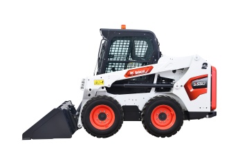 Skid steer transfer machines for road use