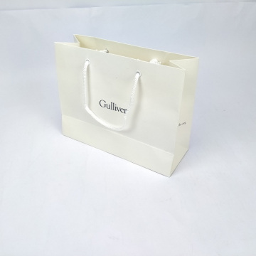 White Handle Paper Clothes Bag