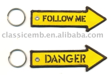 Follow Me sign with arrow keychain patch
