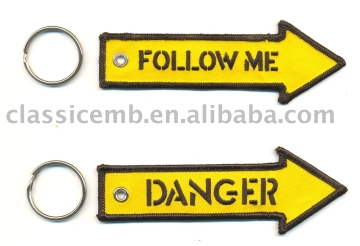 Follow Me sign with arrow keychain patch