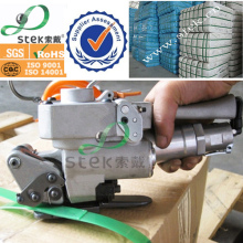 Pneumatic sealless plastic strapping tool