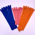 Various colour plastic separating coat zippers