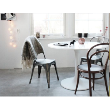 What material is the dining table and chairs?