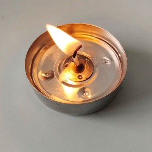 white tealight candle pressed making. We could also do poured making.