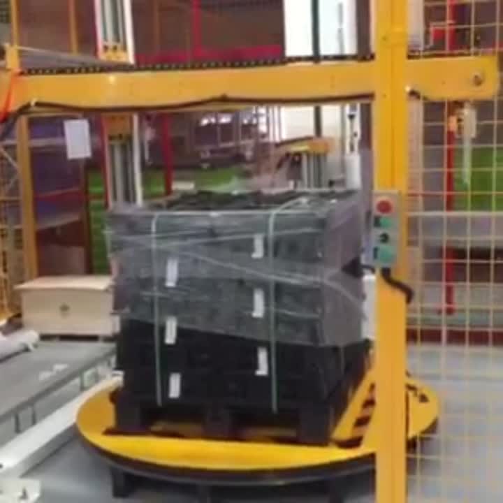 Máquina de embrulho de paletes com folha superior