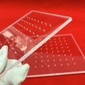 Annealing and Dehydroxylation Polishing of Transparent Quartz Plates with Holes1