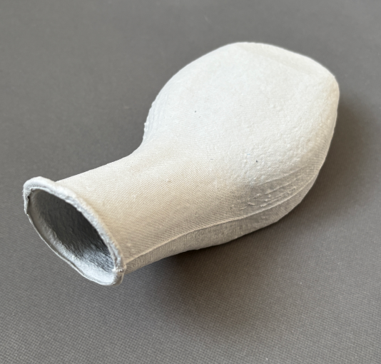 Одноразовый писсуар из бумажной массы для мужского использования