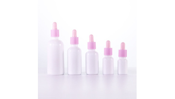 Opal white essential oil bottle with pink dropper