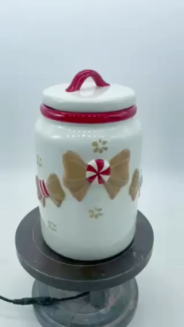 Serie de cubiertos navideños con lazo.