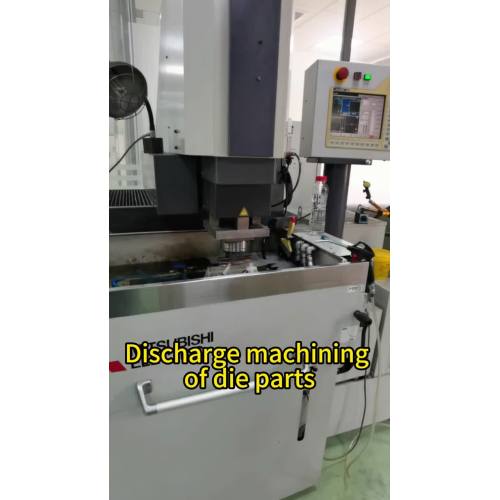 Discharge machining of die parts