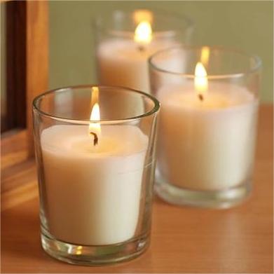 Mini glass candle with different colors use in home and party wedding places