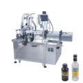 Auto Double Nozzles Rotary Bottle Filling and Capping Machine for Beverages1