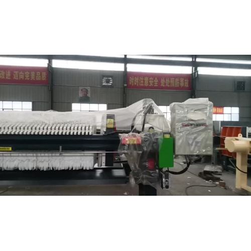 Automatic plate pulling filter press