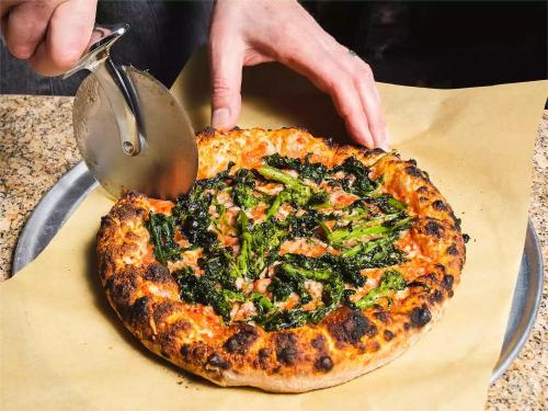 Ditch the pre-made pizza and use our pizza oven to make your own pizza