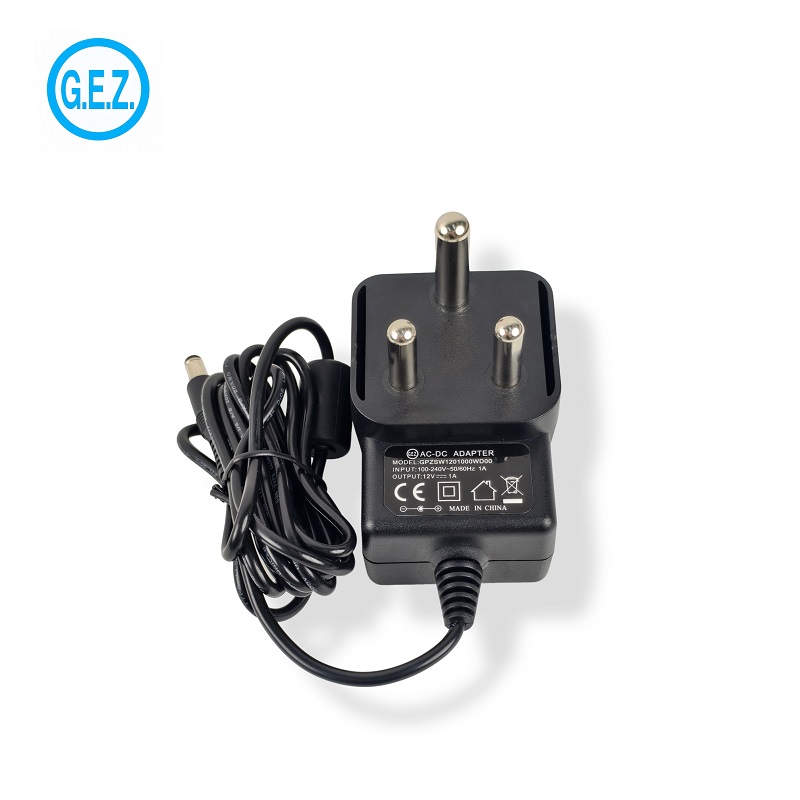 Adapter cumhachd airson mion-chomharrachadh Afraga a-Deas