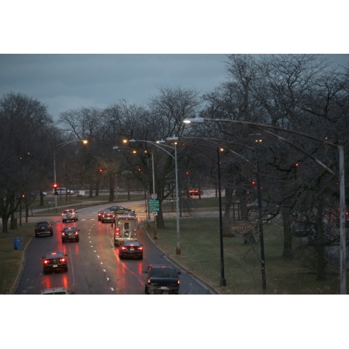 Why do street lights stop flickering when you get out of your car?