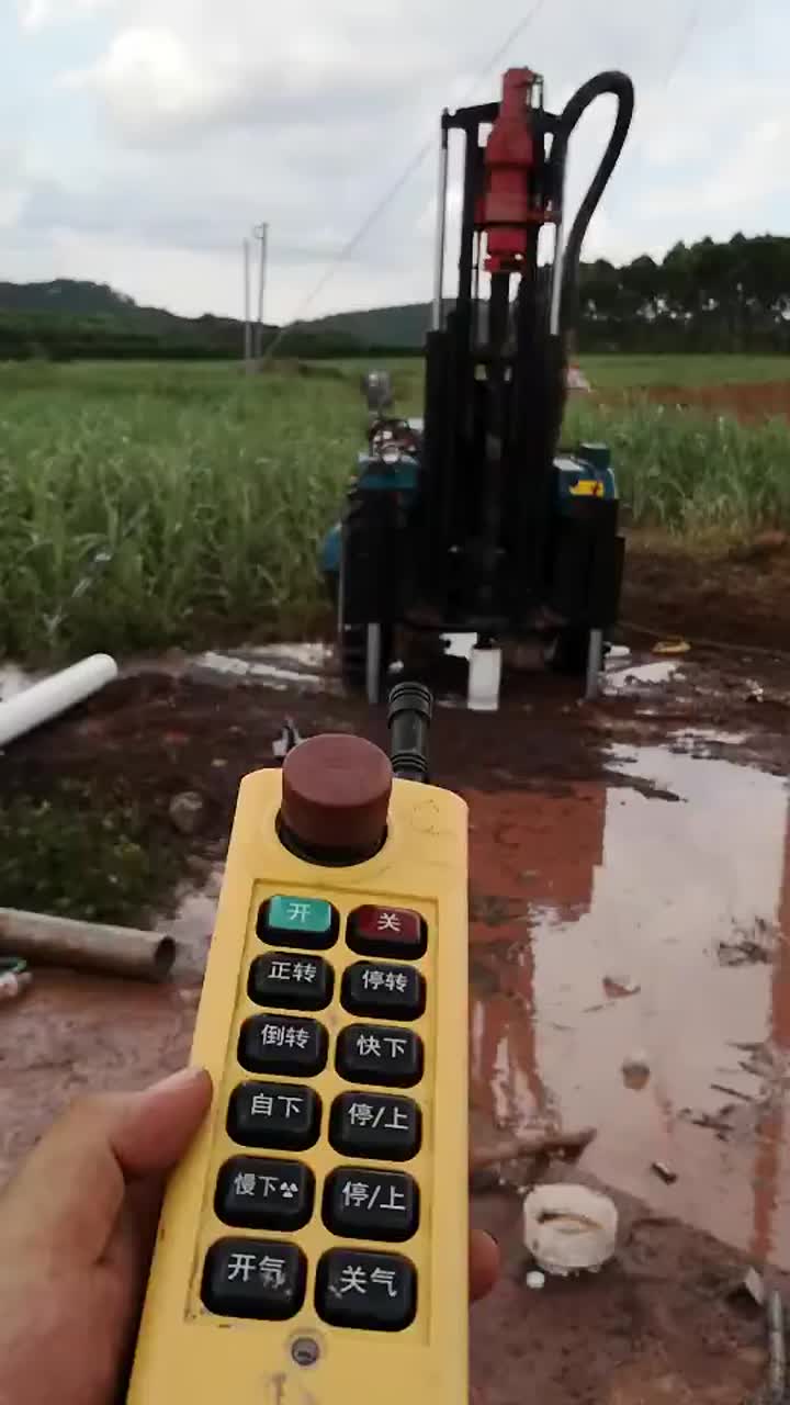 tractor drilling machine remote control at worksite.mp4