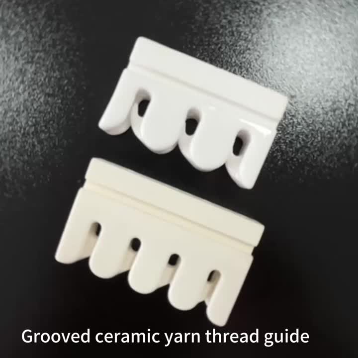 Grooved ceramic yarn thread guide