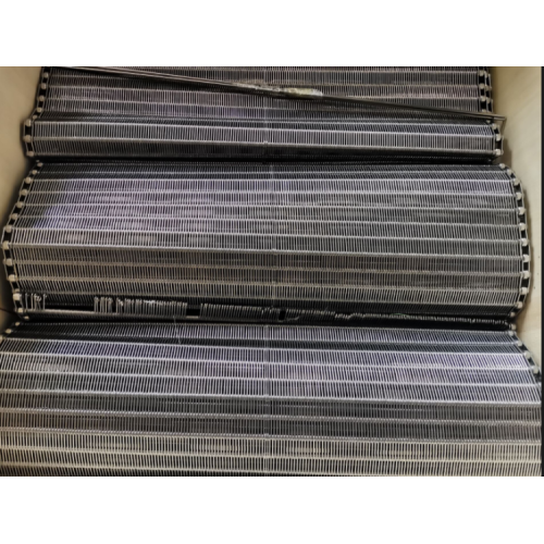 Warum ist ein Metallförderband ideal für schwere Lasten?