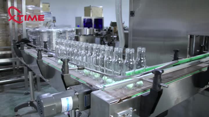 Sauce filling capping labeling and  label cover shrinking production line