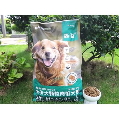 Alimento premium para perros relleno de carne en gránulos grandes