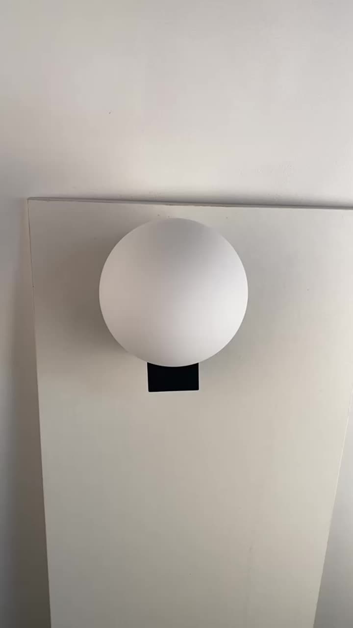 Square box with an opal glass round ball wall lamp