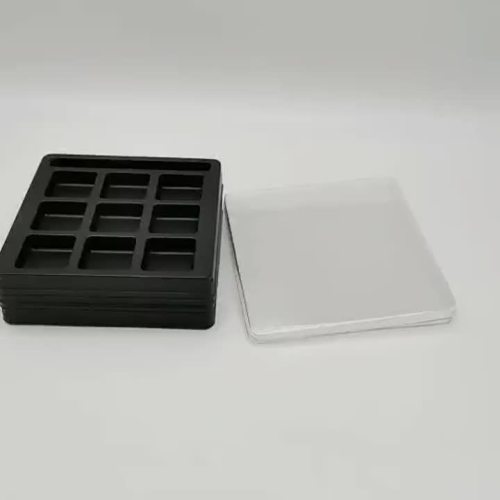 black chocolate plastic tray