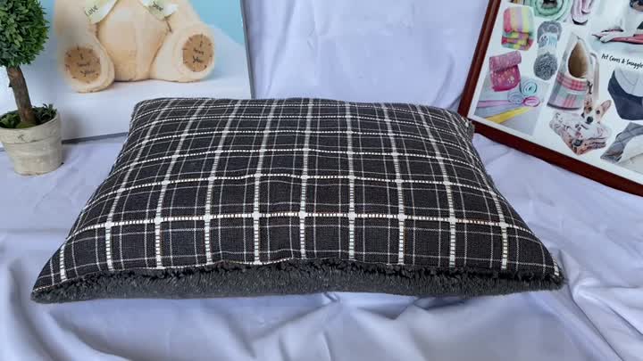 grey/white check design pillow