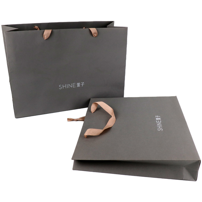 white paper bag with handle